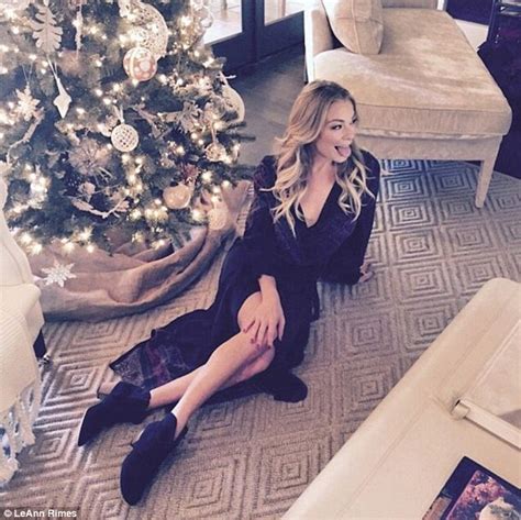 Maybe you would like to learn more about one of these? LeAnn Rimes poses in revealing dress under a Christmas ...