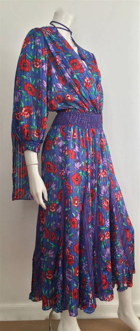 If you are visiting europe, it is. Diane Freis Floral Dress is Size Small. For Sale at 1stdibs