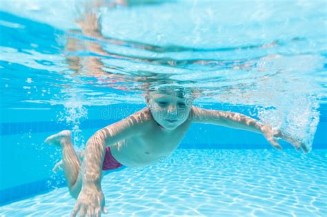 Redhead simonna showing her body underwater. Boy with red hair in pool stock image. Image of hair ...