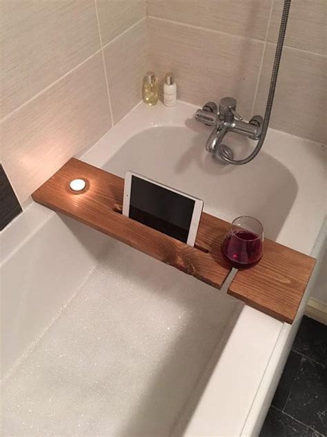 Put all items that you need for taking a bath in the tray that is put next to the tub. Bathtub Bud bath tray with candle tablet | Badrumsidéer ...