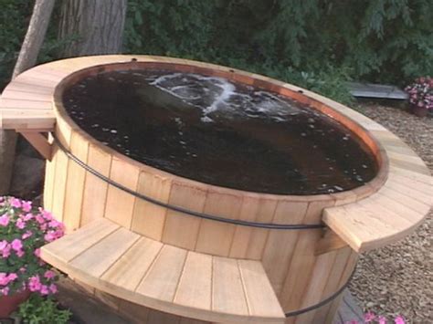 Whirlpools are available that fit into a standard tub space and install almost as easily as a regular tub. How To Install a Hot Tub On A Deck | Hot tub landscaping ...