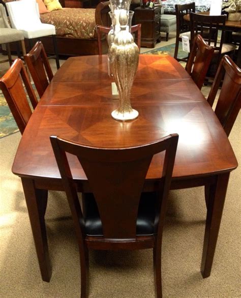 Your dining room will benefit from a sense of openness with a glass table. Cherrywood Dining room set at Miskelly Furniture # ...