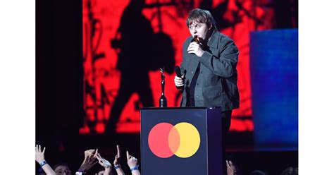 Rag 'n' bone man attends the brit awards 2021 at the o2 arena on may 11, 2021 in london. Lewis Capaldi on Stage at the 2020 BRIT Awards | Lewis Capaldi Posing on the 2020 BRIT Awards ...