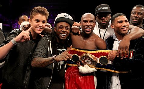 There are many things that define fighters, each in vastly different ways. Photo gallery: Floyd Mayweather & 50 Cent - The Money Team ...