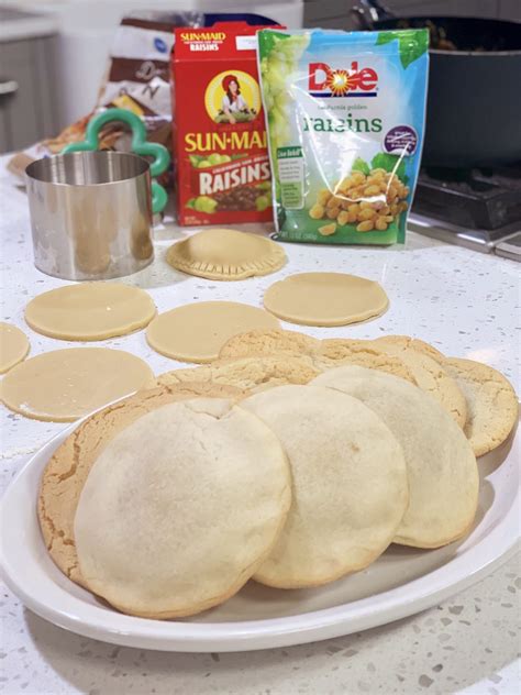 Cook raisins with sugar and water for 10 to 15 minutes, or until thick, stirring occasionally. Raisin Filled Christmas Cookies - cooking with chef bryan