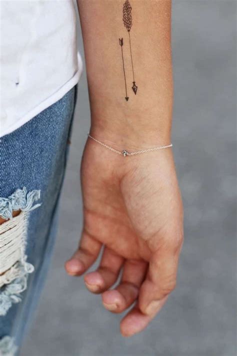 Sun & moon hand tattoos. ARROW TATTOOS FOR MEN - Inspiration and Ideas for Guys