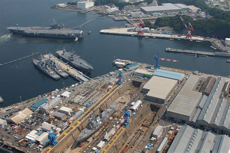 The american naval commodore, matthew c. Photo USS Kitty Hawk and other American warships at United States Fleet Activities Yokosuka ...