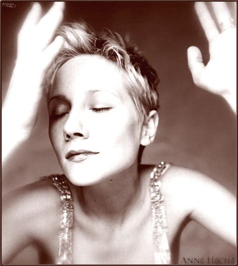 She is wearing her hair with that pale blonde coloration and darker golden ends. Digitalminx.com - Actresses - Anne Heche