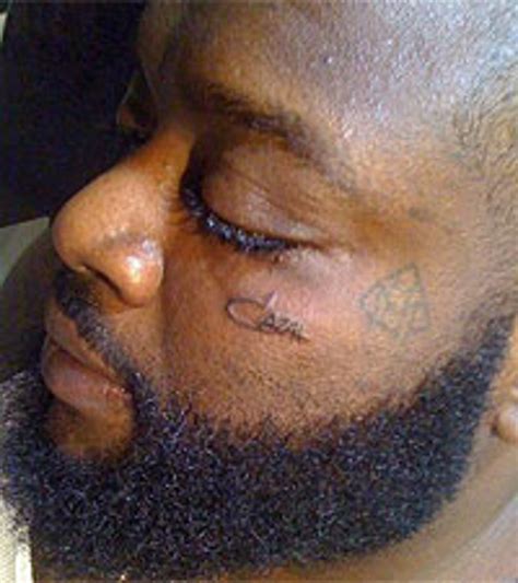 Rick ross — also tattooed with a portrait of biggie on his lower back — isn't the only celebrity to tattoo the icon on his body. Rick Ross Tattoos Cazal Logo on His Face