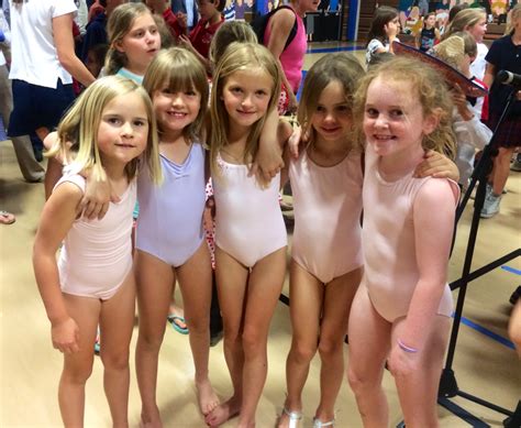 Buxom contestant in a beauty pageant dancing striptease at the talent competition. young-gymnastics-girls-group-picture | Charleston Day School
