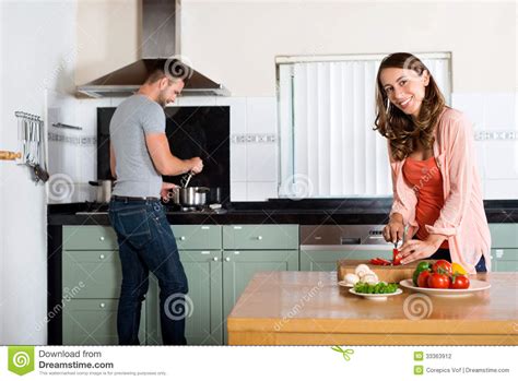 The best deals we've found this week. Couple Cooking In Kitchen stock photo. Image of cutting ...