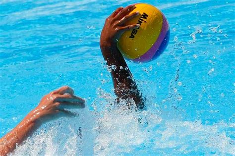 White outline grunge water polo ball with ink blots isolated on black background. Imperiapost - L'informazione libera della tua città ...