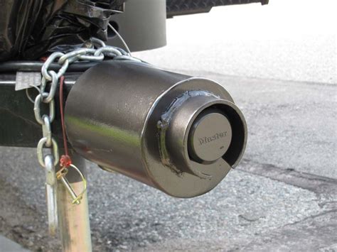 Attaching the trailer to the hitch is done by lowering the pintle loop over the pintle hook and closing the clamp at the top of the hitch, holding the loop in place. Homemade Coupler Lock - Dutchmen Owners