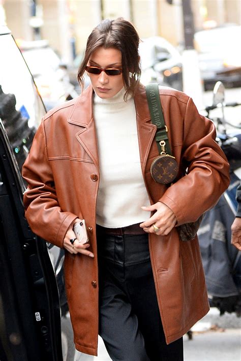 Bella wearing tatras x riot hill fall 2020 and dorateymur patent sandals. Bella Hadid Street Fashion - Paris 01/14/2020 • CelebMafia