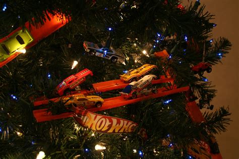 Hot wheels swirl decorations 12ct cardstock & foil decorations. Our 2014 Hot Wheel Christmas tree. | Hot wheels christmas ...