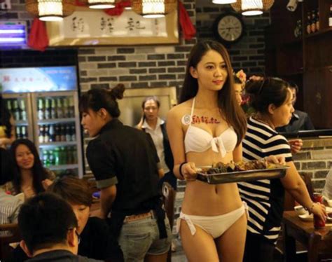 Mature waitress serves a visitor. Weird Restaurant In China Where Waitresses Work Half-Naked ...