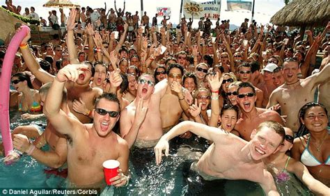 In front of a strip of bars and restaurants on south beach during spring break amid the coronavirus pandemic, in miami, florida, u.s., march 27, 2021. Rowdy Fourth of July party at a floating Bronx pool sees ...