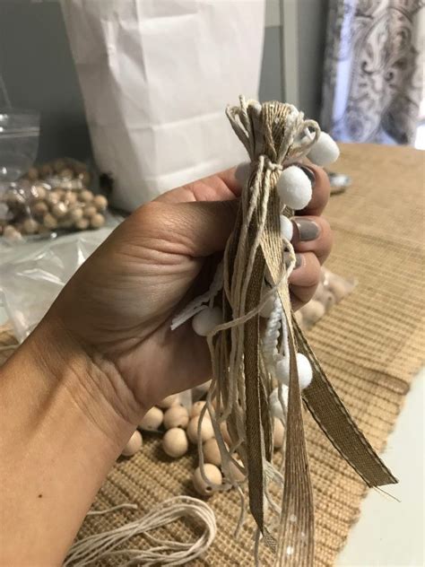 Remember, this will give you two tassels for each strip. Wood Bead Garland with Ribbon Tassels | Wood bead garland ...