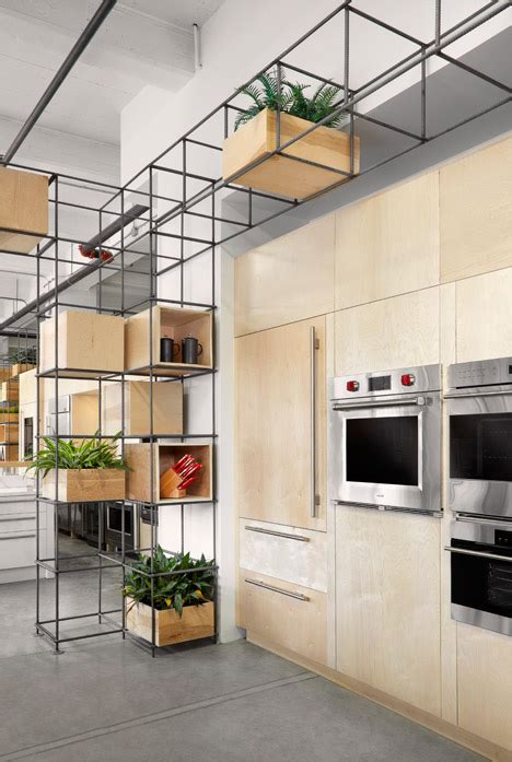 At kleinburg kitchens inc, your design is special because it is specifically crafted to your style and needs and since it has the perfect balance of looks functionality & quality,making it as enjoyable as it is elegant. Steel rebar forms storage system at Toronto kitchen showroom