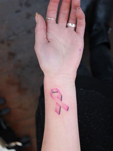 Heart and green ribbon tattoo on wrist. 25+ trending Cancer ribbon tattoos ideas on Pinterest ...