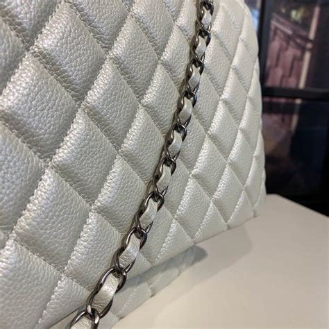 Bring out your inner nocturnal being with the 900 global after dark blue/silver pearl! Chanel XXL Flap Bag 46cm Caviar Leather Silver Hardware ...