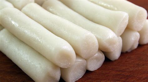 This sticky rice cake is steamed. Garaetteok (cylinder-shaped rice cakes for tteokguk or ...