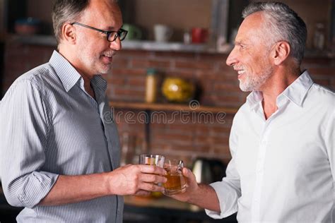 Friendship isnt about who youve known the longest. Happy Male Friends Meeting After Long Time Stock Image ...