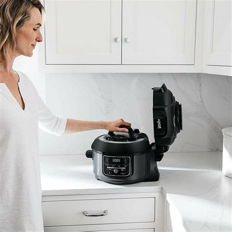 When the cooker contains hot oil, hot food, or hot liquids, or if the cooker is under pressure. Ninja OP101 Foodi 7-in-1 Pressure, Slow Cooker, Air