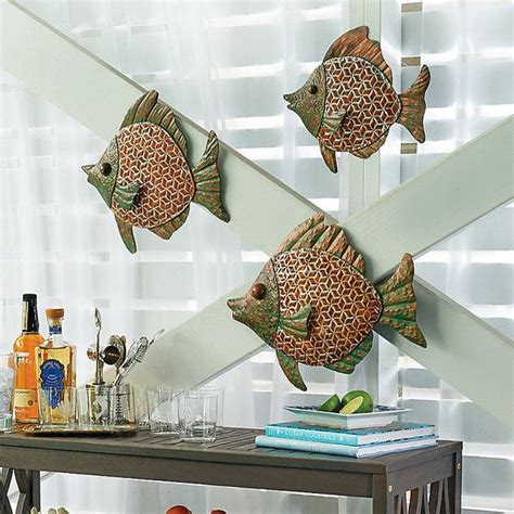 There's a place for this in your home, we are sure. Improvements Tropical Fish Metal Wall Decor-Set of 3 ($30 ...