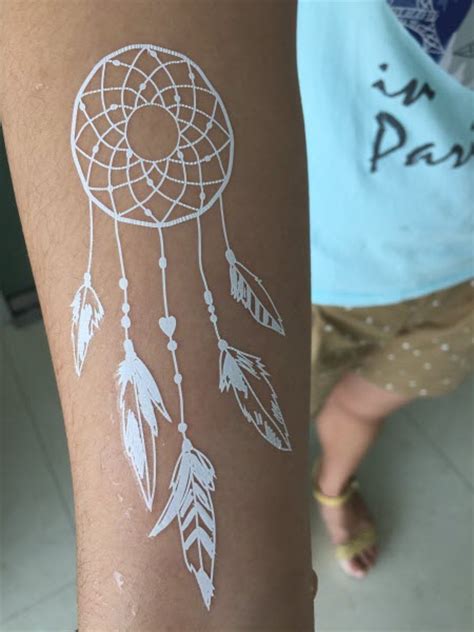 This tattoo, however, goes in the opposite direction and yet manages to not overdo it. White lace tattoos | Temporary Tattoo Blog