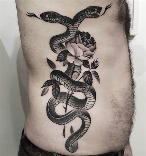 Want a minimalist tattoo to share with the love of your life? Two-headed Snake & Rose | Odd Stuff Magazine