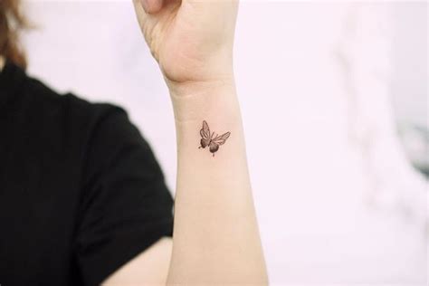 Colored barn owl head tattoo design on forearm. Shaded Butterfly in 2020 | Small wrist tattoos, Tiny wrist ...