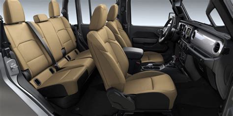 The 2021 jeep gladiator's interior is similar in size to the jeep wrangler unlimited and features the same level of materials and trim. 2020-Jeep-Gladiator-Interior-Seating-Sport-Cloth-Tan_o ...