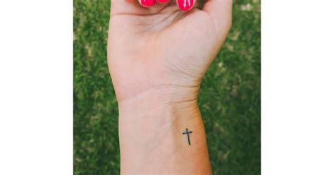 Cross tattoo represents different things to people. Cross tattoo on Kerry's wrist.