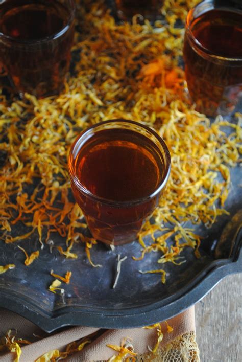 Dried marigold flowers are used for extraction of. Dia de Los Muertos - Marigold Infused Tequila | Dia de los ...