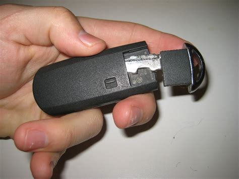 How to open the remote key for many 2008 through 2013 mazda models for the purpose of replacing the battery. Mazda-CX-5-Key-Fob-Battery-Replacement-Guide-028