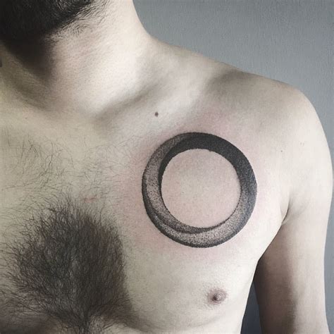 Women, in older times, were used to get dot tattoos on their chin and next to eyes. Dotwork circle tattoo on the chest (With images) | Circle tattoo, Circle tattoos, Tattoos