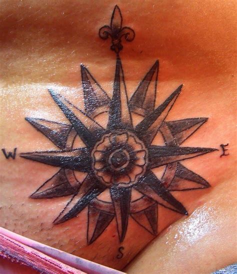 The tiny rose tattoo on breast for girl: Wind rose intimate tattoo - Tattooimages.biz