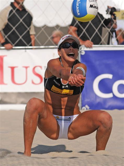 Beach volleyball is a team sport played by two teams of two players on a sand court divided by a net. Carolina Salgado | Beach volleyball pictures, Beach ...