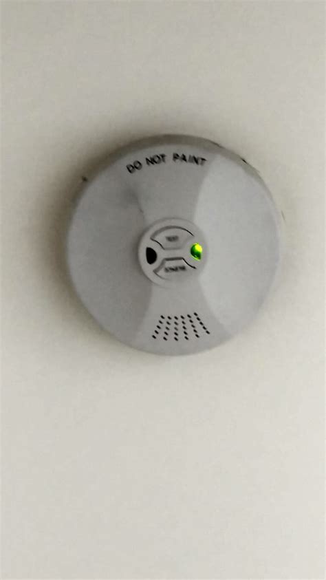 The smoke alarm should beep once to show a new battery has been connected and it is functioning properly again. Can't get this smoke alarm to open - Home