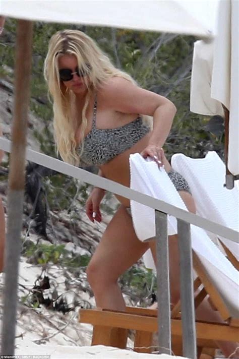 Do you like this video? Jessica Simpson flaunts body in leopard print bikini on ...