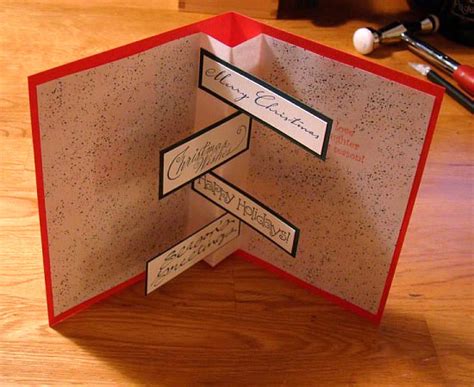 The very first thing that you do is you put a load of glue on the coloured card and we're then going to stick that onto the white card. 20+ Beautiful Diy & Homemade Christmas Card Ideas For 2012