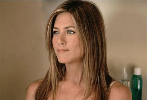 At the beginning of the movie during the photo montage, there were a couple of shots with jennifer wearing a white sweater. The Break Up - Jennifer Aniston Photo (521386) - Fanpop