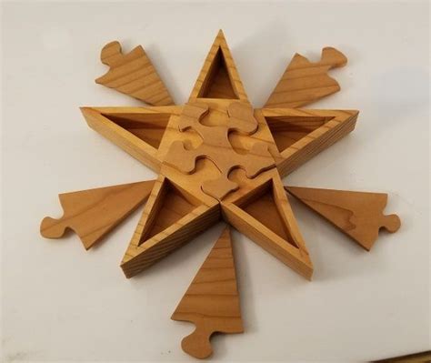 Karakuri club 2003 christmas present, star puzzle. Wooden Star Puzzle | Wooden stars, Wooden, Stars