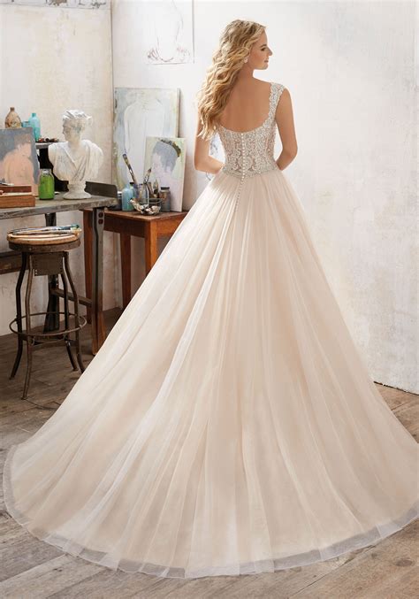 We have an extensive selection of wedding gowns, prom dresses, mother of the bride, bridesmaids, and other special occasions on sale. Mori lee 8126 Marigold wedding dress - Catrinas Bridal