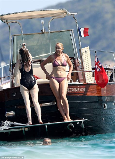 Import & export on alibaba.com. Jerry Hall displays her flat tummy on a boat in a teeny ...