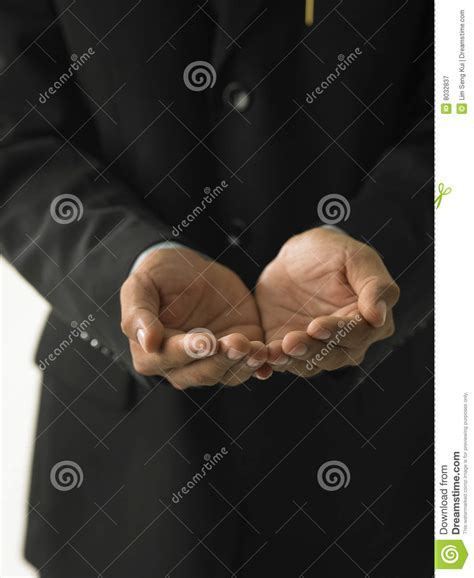 Man Holding Out Cupped Hands Stock Image - Image of body, communication ...