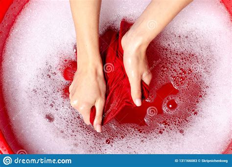 How to wash dark and coloured clothes. Women Washing Color Clothes In Basin Enemale Powdered ...