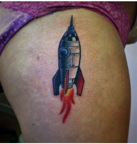 This is a traditional ship tattoo design. Little rocket space ship tattoo - Done by Steve Murzin at ...