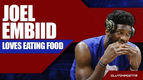 He is billed at 7' but is he really that tall? Joel Embiid eating the cafeteria - YouTube